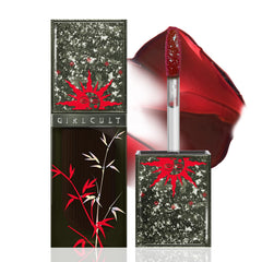GIRLCULT Glass Shine Lip Gloss bottle close-up, showcasing high-shine color and smooth application.