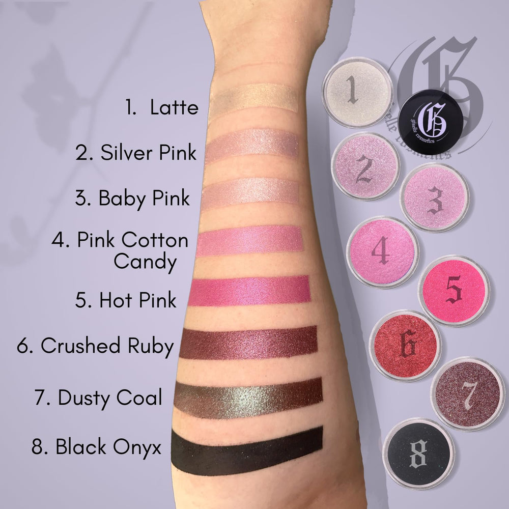 Closeup of Giselle Cosmetics Silver Pink mineral loose eyeshadow palette and texture