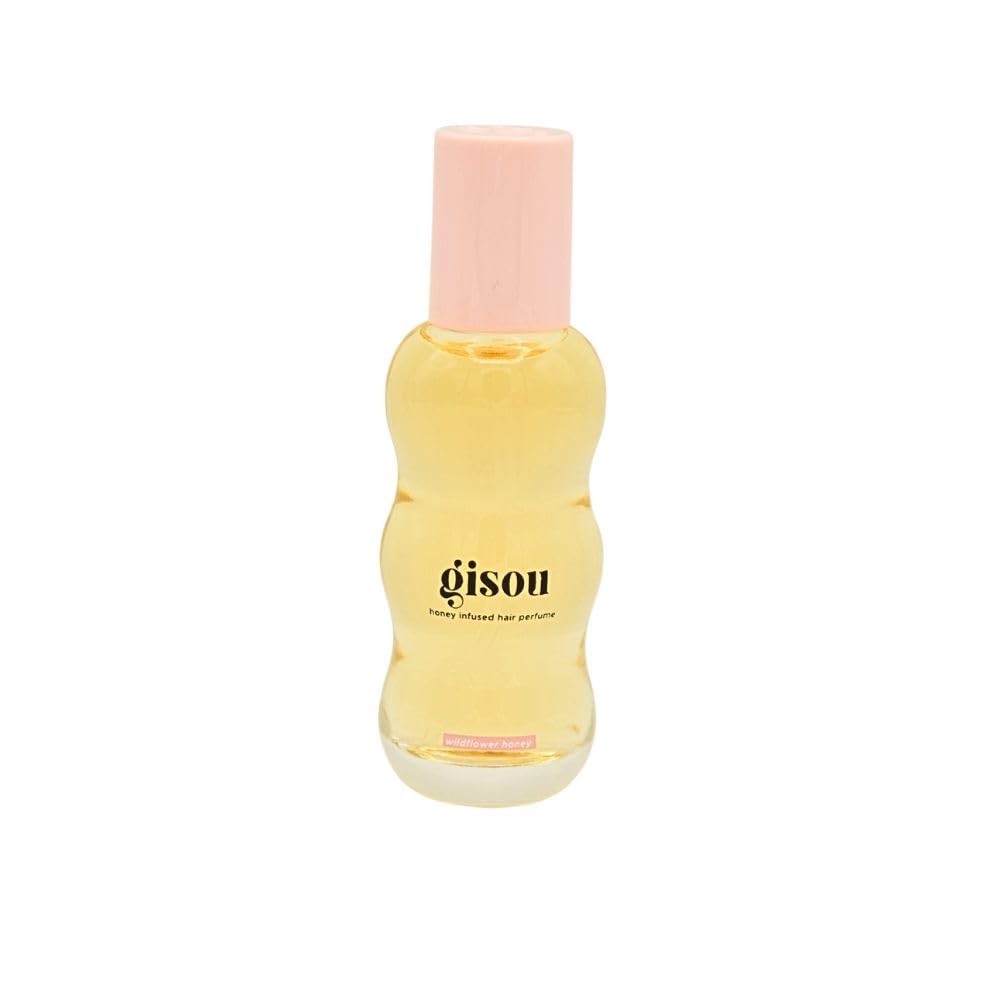 Gisou glossy hair after using the Glow All The Way set, ready for styling.