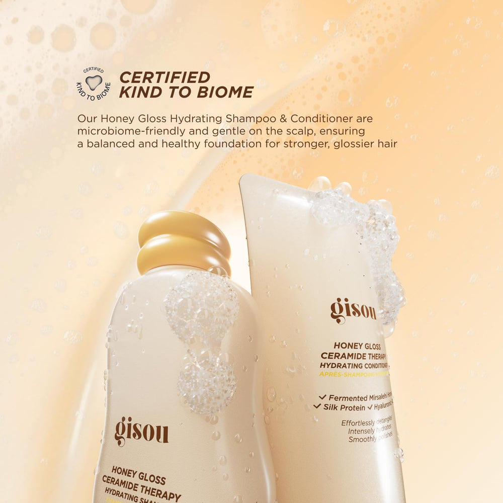 Gisou Honey Gloss Ceramide Therapy Hydrating Shampoo lather in hand reveals cleansing power.