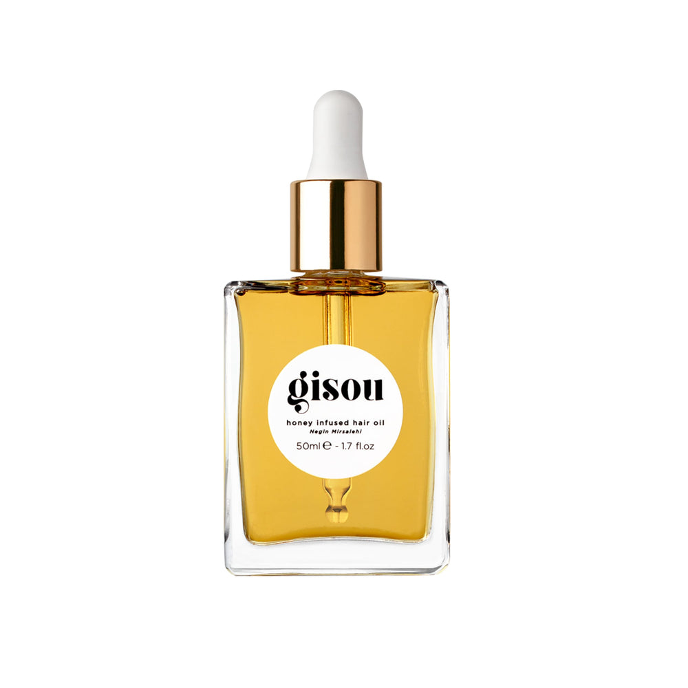 Gisou Honey Infused Hair Oil bottle pour delivering lightweight hydration.