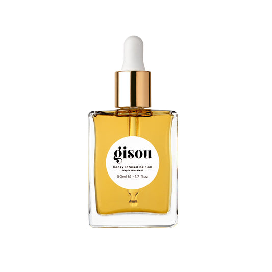 Gisou Honey Infused Hair Oil bottle pour delivering lightweight hydration.