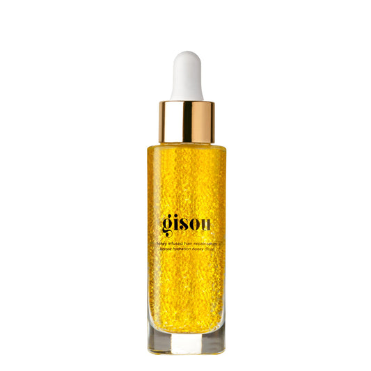 Gisou Honey Infused Hair Repair Serum bottle promises shine and nourishment.