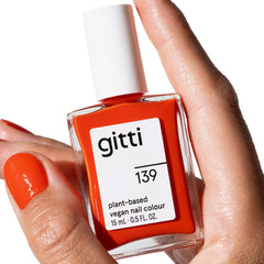 gitti fiery orange nail polish bottle showing vibrant color and shine