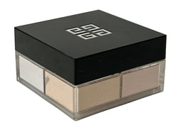 Givenchy Prisme Libre loose powder being applied with a brush for versatile finish.