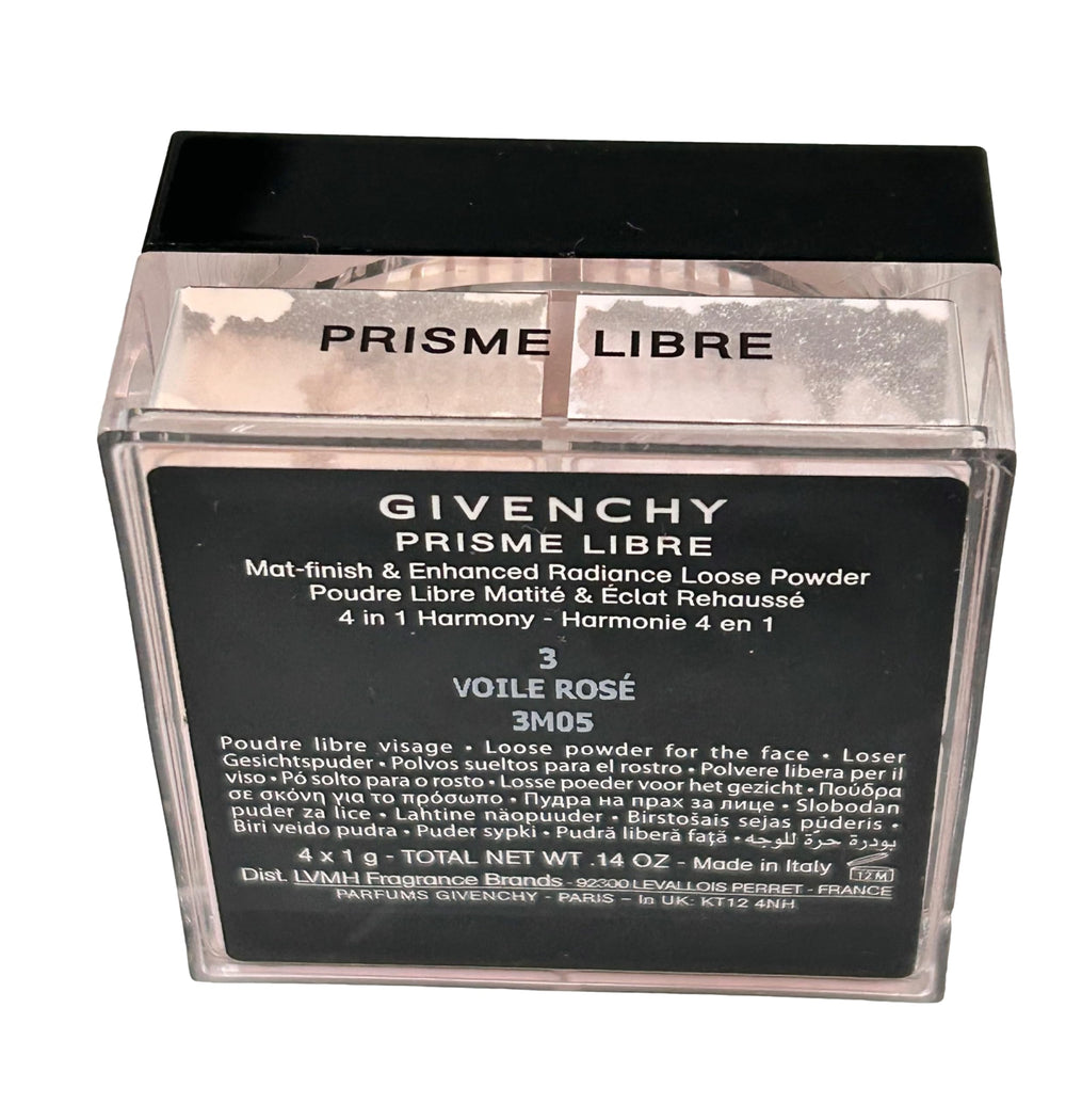 Application of Givenchy Prisme Libre powder using brush for buildable coverage.
