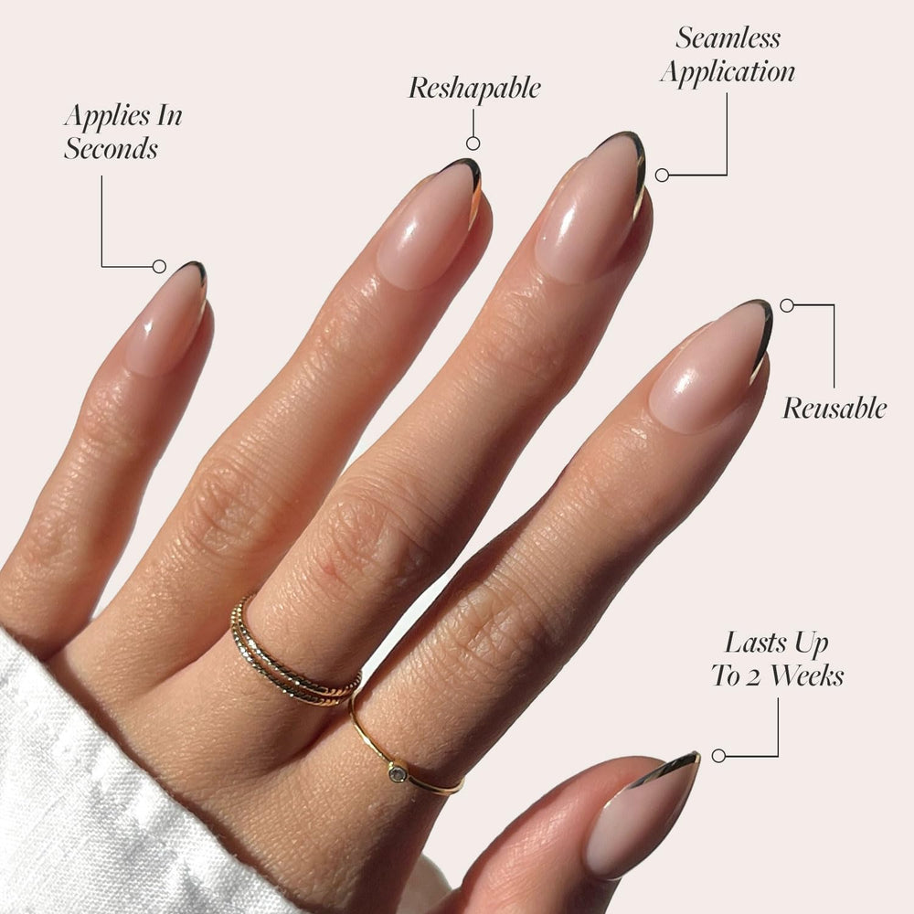 Glamnetic glossy gold nails on a hand for a chic, versatile look