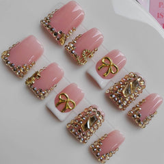 Gleamrain Duck press-on nails in pink with rhinestones and bow offer instant chic style