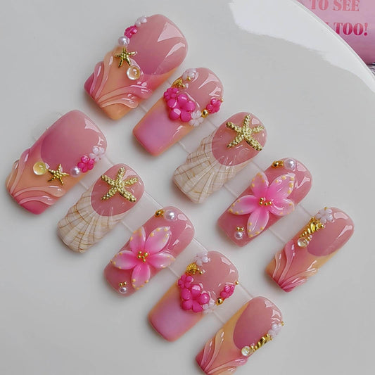 Gleamrain nails close-up shows floral-patterned long square tips for elegant everyday wear.