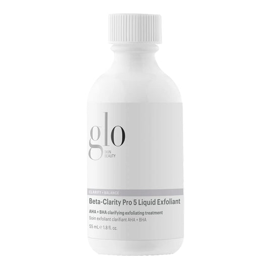 Glo Skin Beauty Beta-Clarity Pro 5 bottle on vanity, clarifying exfoliant for balanced skin.