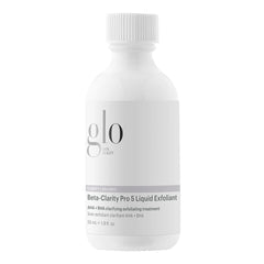 Glo Skin Beauty Beta-Clarity Pro 5 bottle on vanity, clarifying exfoliant for balanced skin.