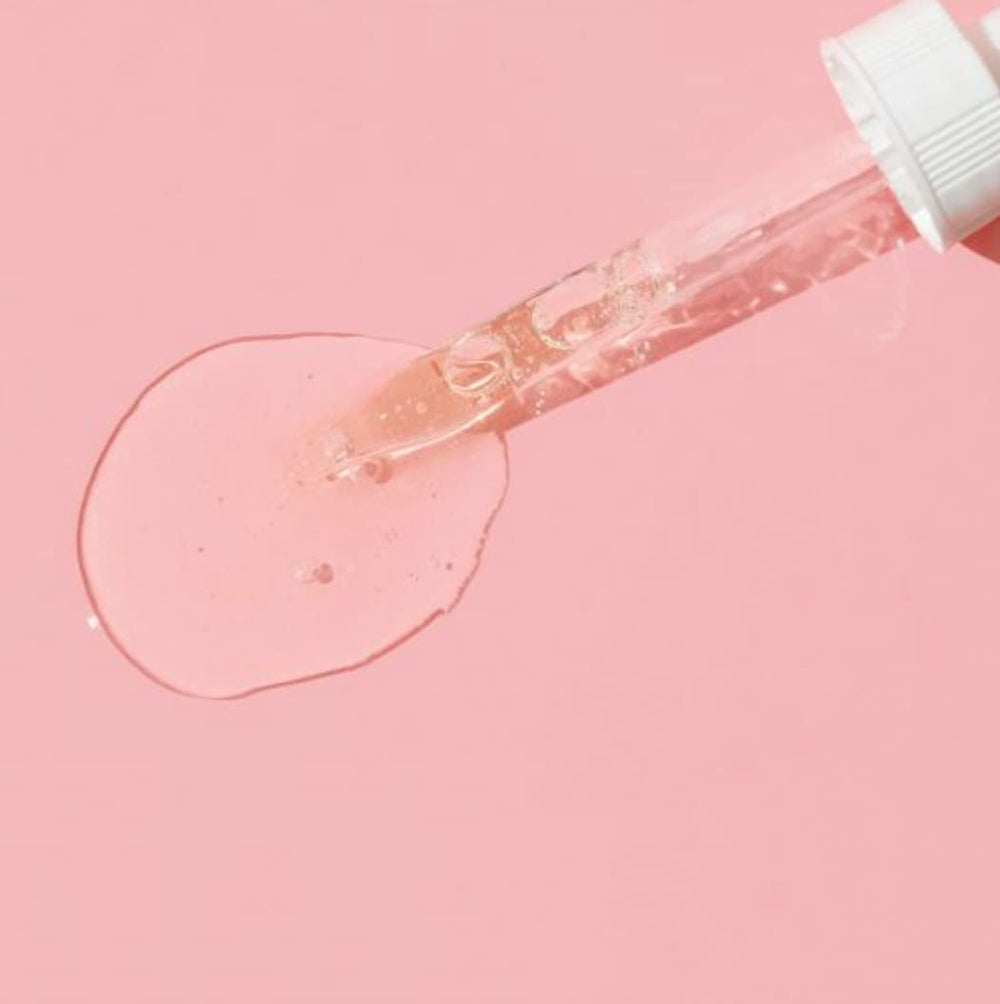 Glo Skin Beauty Hydra-Bright Drops being applied for a fresh look
