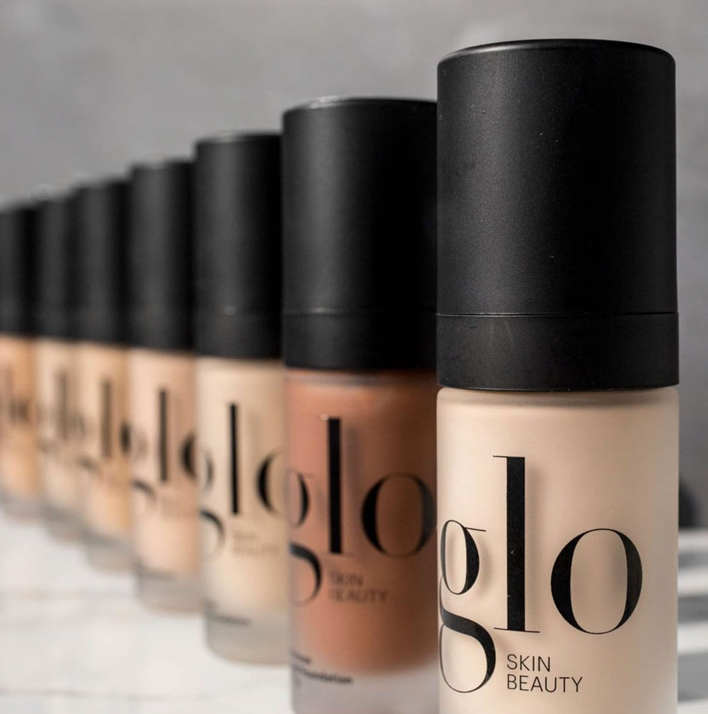 Glo Skin Beauty Luminous Foundation pump top showing easy, mess-free application.