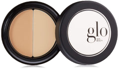 Glo Skin Beauty Under Eye Concealer Duo bottle close-up, dual shades for customization.