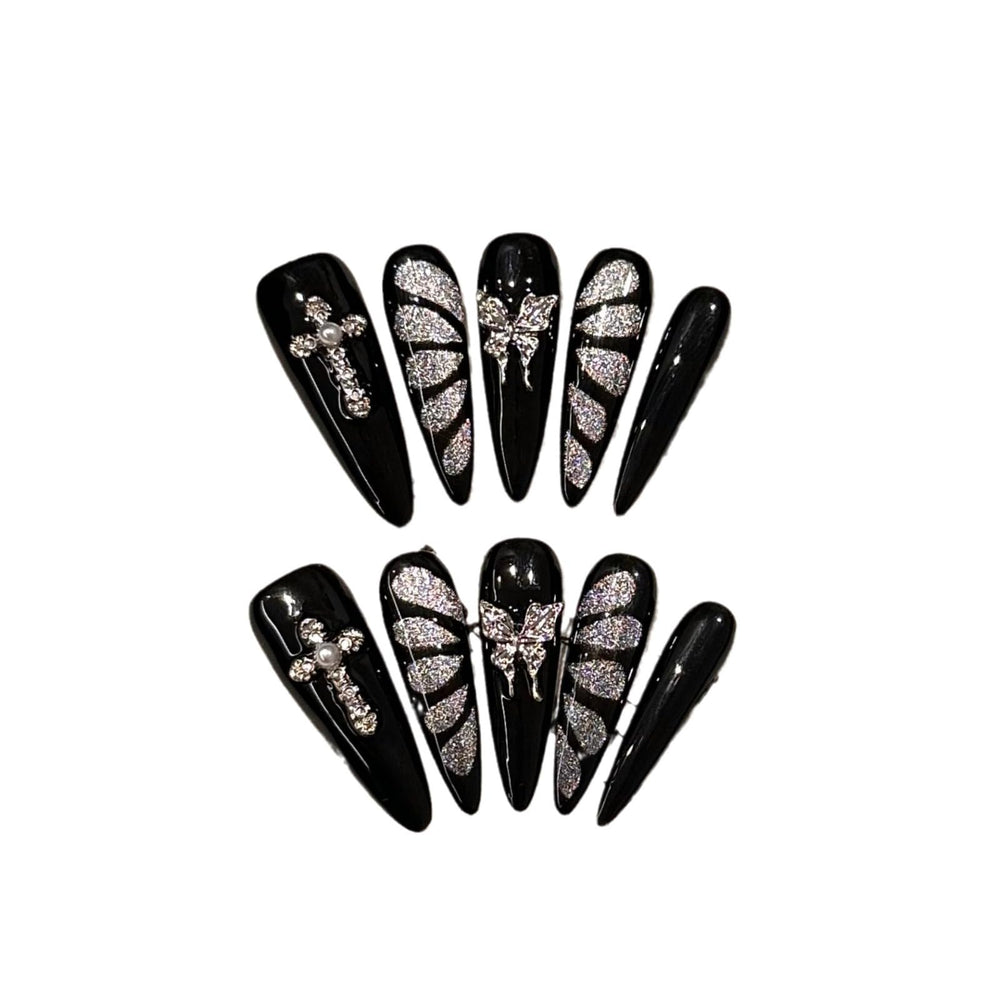 GLORS black and silver butterfly cat eye nails in long stiletto shape for bold at-home manicure