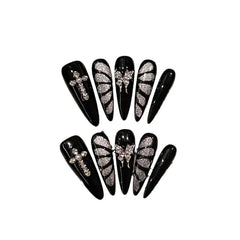 GLORS black and silver butterfly cat eye nails in long stiletto shape for bold at-home manicure