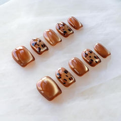 GLORS leopard print cat eye nails with metallic shine for everyday glamour