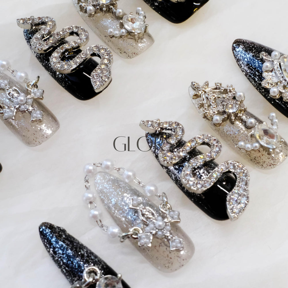 GLORS long almond nails in mixed elements suit fashion-forward wear.