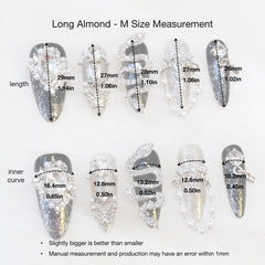 GLORS pearl-dangle nails capture subtle movement in candlelight.