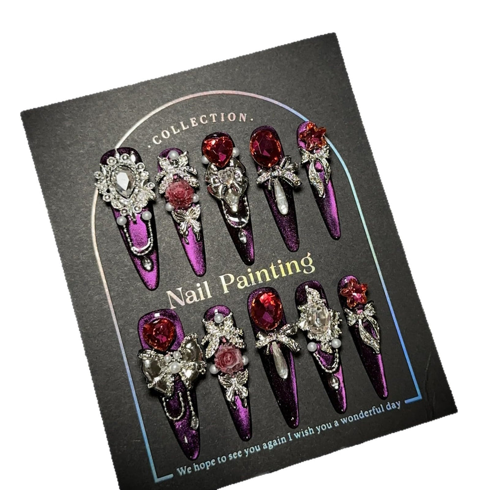 GLORS luxury long press-on nails in purple glitter stiletto with rhinestones for at-home glamour