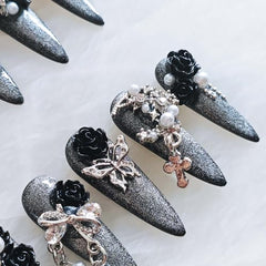 GLORS nails featuring pearl embellishments for refined elegance.