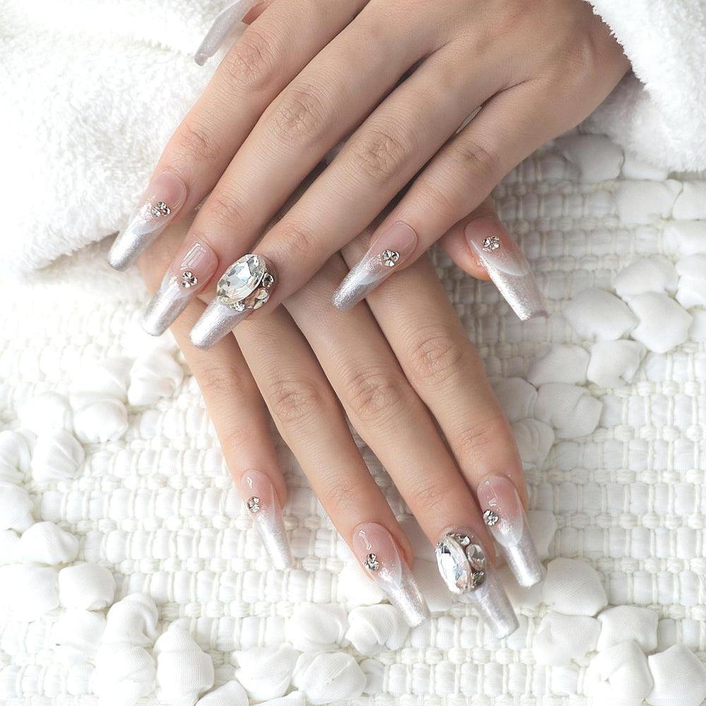 GLORS press-on nails in long ballerina coffin with silver glitter for chic length.