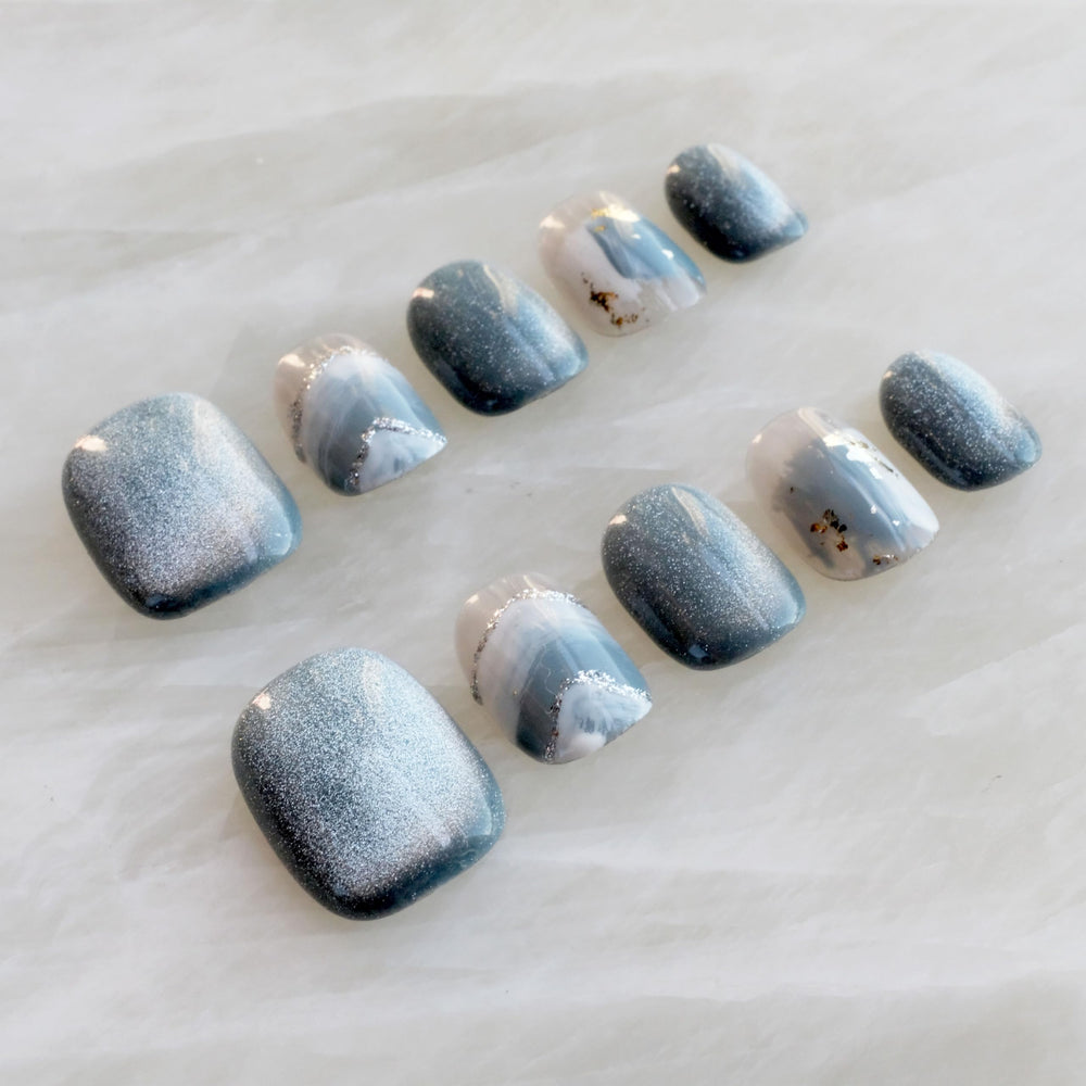 GLORS blue white glitter adds sparkle without being heavy on nails.