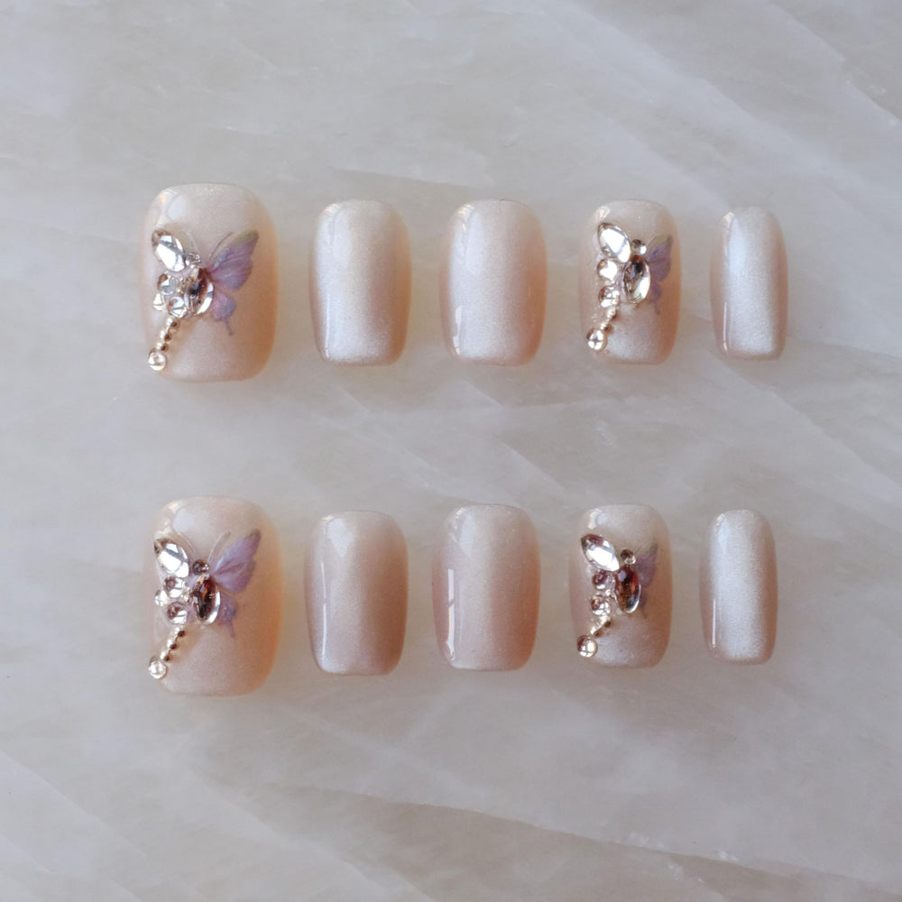 GLORS Purely Handmade nails with butterfly design for chic everyday wear