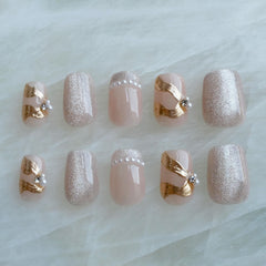 GLORS Purely Handmade nails in elegant pink pearl gold for salon quality wear