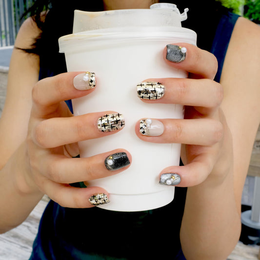 GLORS Purely Handmade press-on nails with gold and pearl accents for a salon-quality manicure