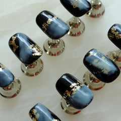 GLORS easy application nails with gold glitter accents for quick at-home use.