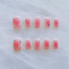 GLORS short square press-on nails in pink with silver stars for quick, stylish manicures.