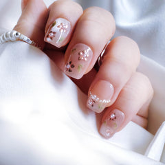 GLORS silk flower-inspired accents with metallic touches on nails