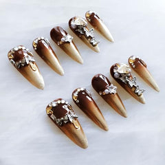 GLORS stiletto nails showcase 3D rhinestones for a sparkling effect