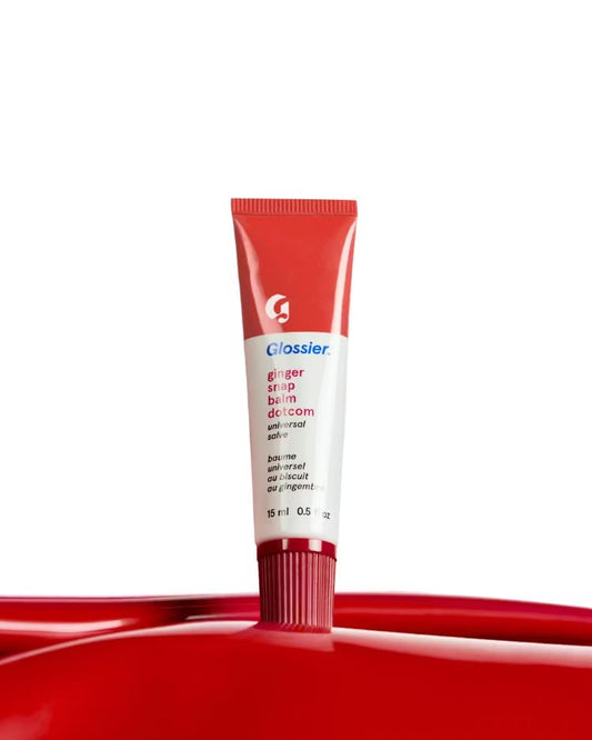 Glossier Balm Dotcom Gingersnap lip balm twist for on-the-go hydration.