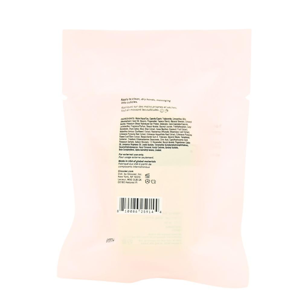 Glossier Hand Cream Sandstone packaging shows palm-size convenience for on-the-go moisture.