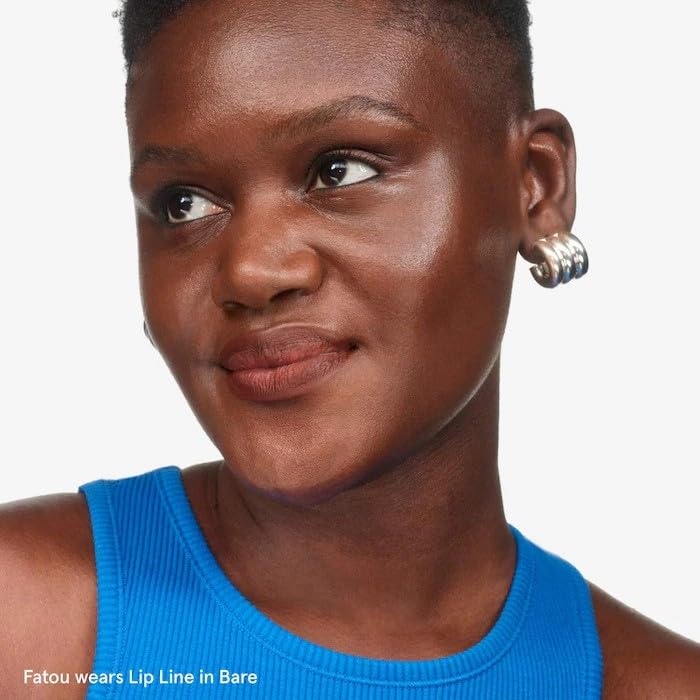 Glossier Lip Liner Bare on natural-look lips offers everyday definition and subtle enhancement.