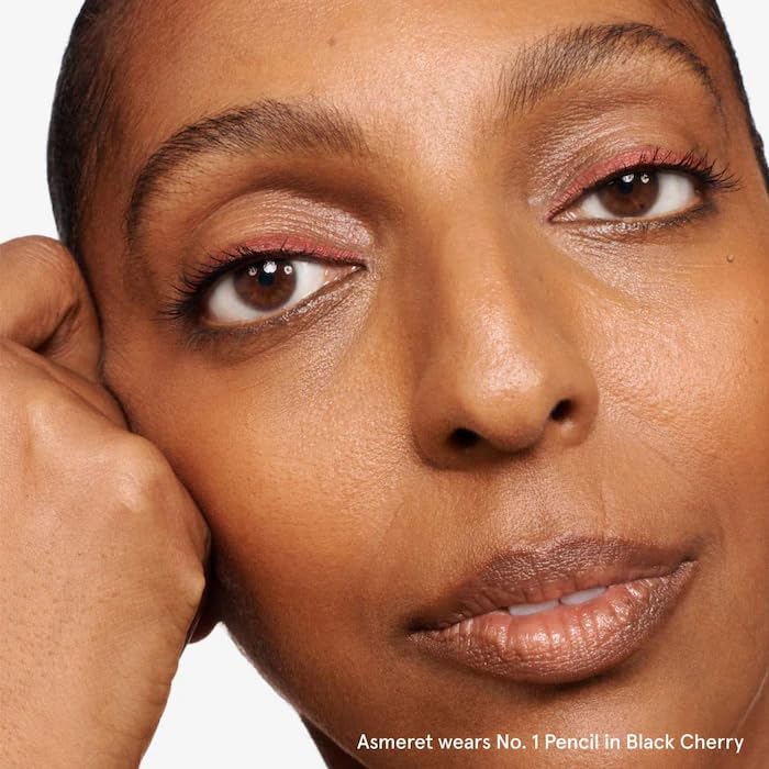 Glossier Lip Liner Black Cherry applied on lips shows defined edge.