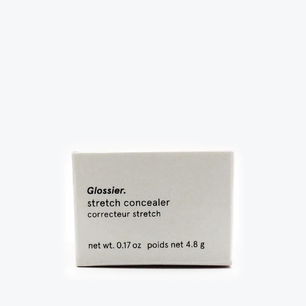 Glossier Stretch Concealer G10 dewy finish blended into skin for brightened, natural look