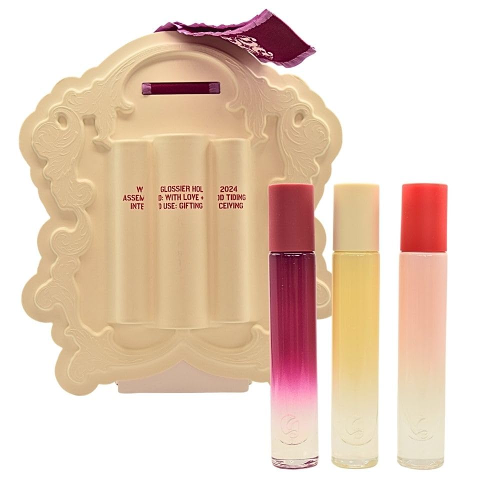Glossier You travel trio bottles with thumbprint detail for on-the-go scent touch-ups.