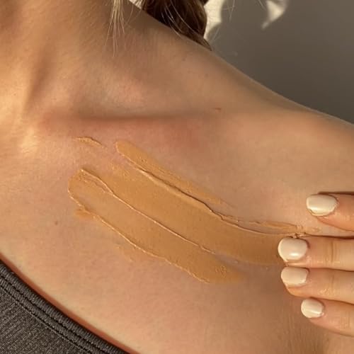 Glowbiotics tinted reef-safe sunscreen application illustrating quick absorption.
