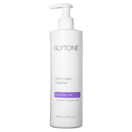 Glytone Mild Cream Cleanser bottle on bathroom shelf for daily cleansing.