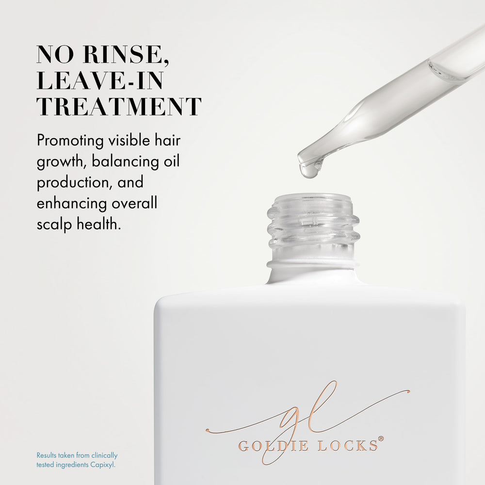 Goldie Locks Scalp Serum dropper close-up for precise dosing and scalp care.