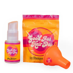 Good A Hair Day dry shampoo bottle demonstrates oil absorption for refreshed hair.