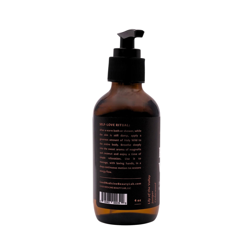 GOOD MEDICINE INTUITIVE SKINCARE Holy Wild Deep Forest Body Oil on a forest scene suggesting natural nourishment.