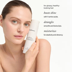 Goop Amino Acid Conditioner creamy texture close-up for detangling