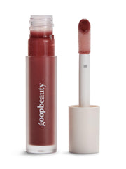 goop Hydra-Barrier Gel Gloss Spice bottle closeup showing hydrated lips