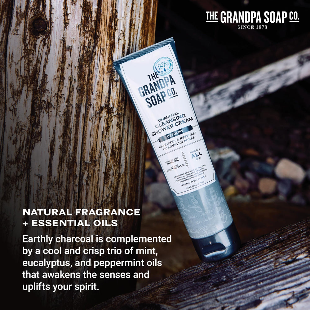 Grandpa Soap charcoal shower cream dispensing action suggests convenient daily cleansing.