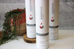 GREAT CLIPS Solutions Violet Shampoo lather on hair to enhance cool tones