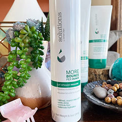 Great Clips Solutions Curl Whipped Mousse adds body to damp curls.